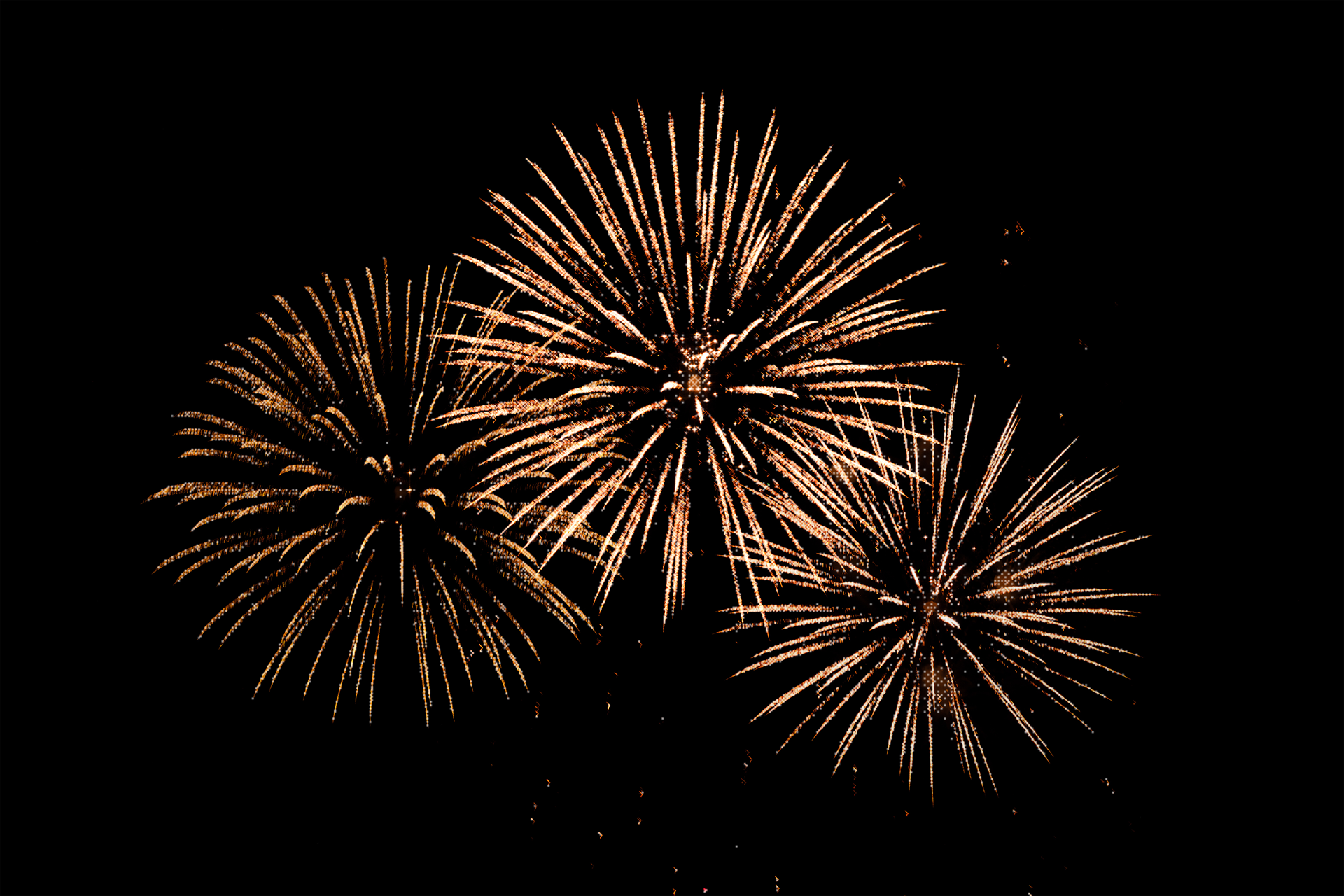 Three gold fireworks bursting on a black field